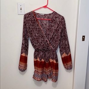 Brownish/orange romper. Size S.